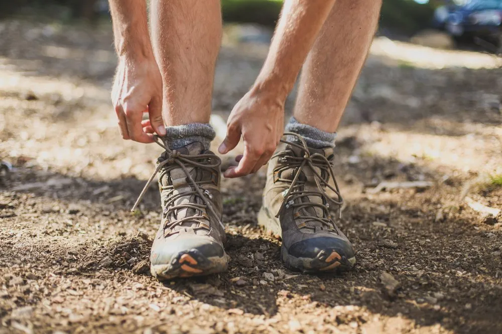 Lacing boots tight to prevent hikers toenail